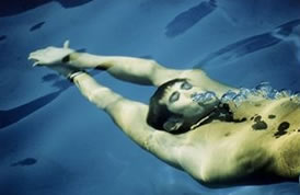 Swimming after you land at your destination can help re-hydrate your skin